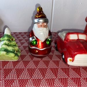 Christmas salt shakers, Santa Claus, truck, Christmas tree.